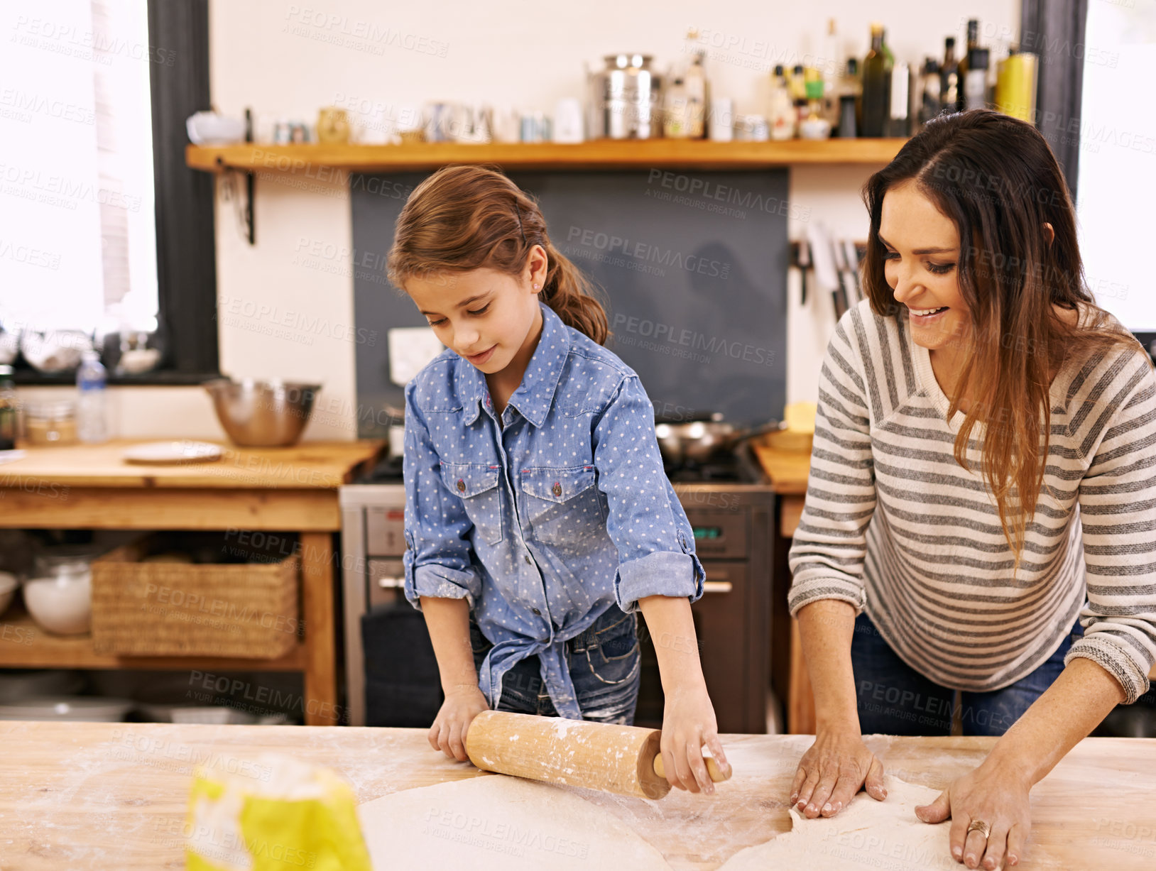 Buy stock photo Learning, mother or child baking pizza in kitchen teaching recipe for help, support or development in home. Kid, rolling pin or girl cooking with parent, family or mom for dinner, supper or lunch