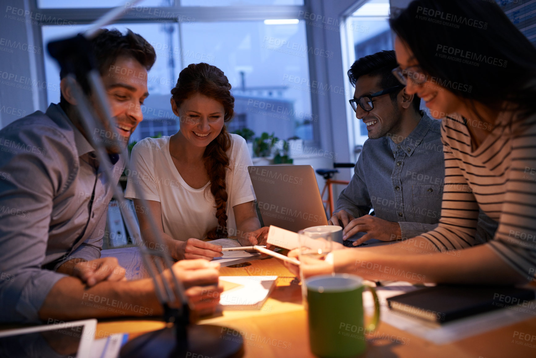 Buy stock photo Teamwork, night and business colleagues working in the boardroom for planning, strategy or innovation. Meeting, collaboration and overtime with a team or group of employees at work in the evening