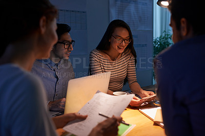 Buy stock photo Teamwork, dark and a business group working in the boardroom for planning, strategy or innovation. Meeting, collaboration and overtime with a group of employees at work at night or in the evening