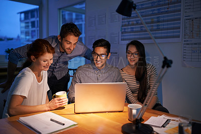 Buy stock photo Collaboration, night and an employee team on a laptop, working in the boardroom for planning, strategy or innovation. Meeting, teamwork and overtime with a business group at work in the evening