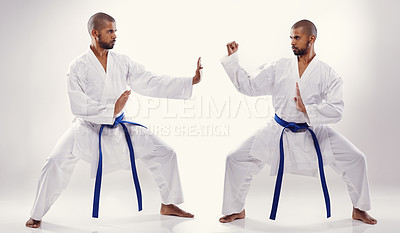 Buy stock photo Two people doing karate