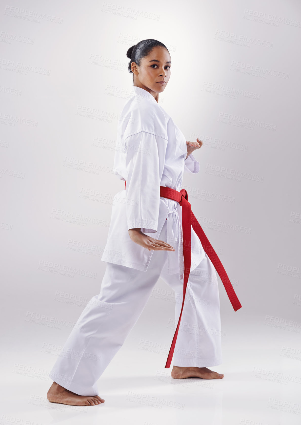 Buy stock photo Woman, portrait and karate fitness in studio, warrior and martial arts on white background. Black person, athlete and red belt for taekwondo, discipline and warrior ready for self defense or battle