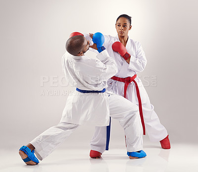 Buy stock photo Two people doing karate