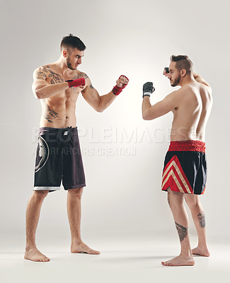 Buy stock photo Full length shot of MMA two fighters ready to battle