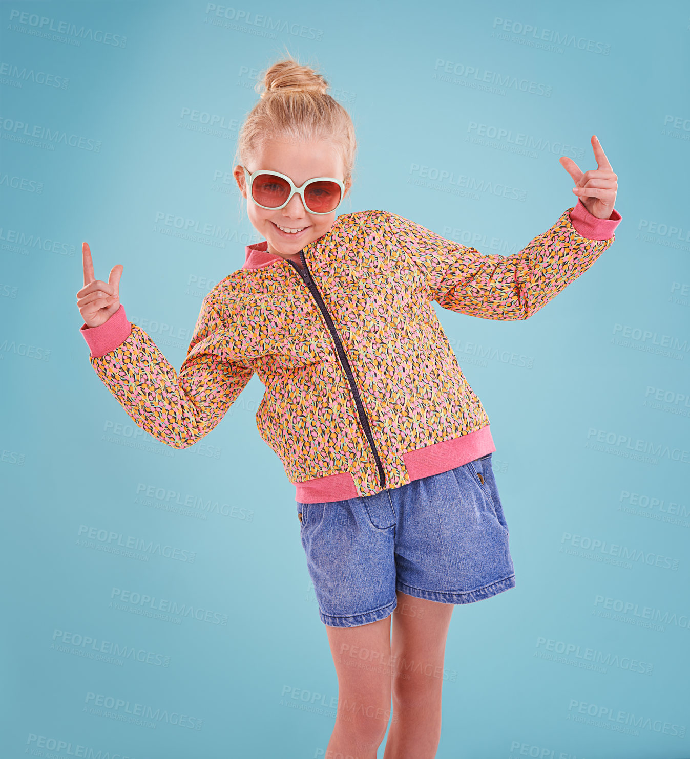 Buy stock photo Studio shot of a little girl wearing funky glasses on a blue background