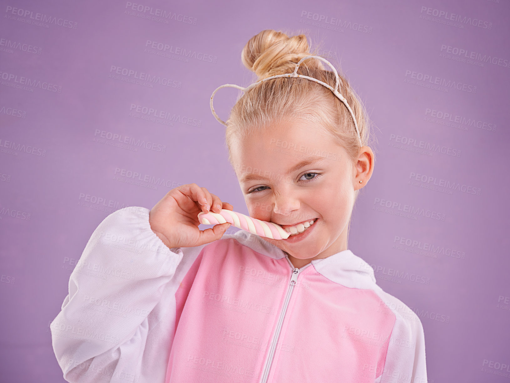 Buy stock photo Studio, portrait and child with candy, marshmallow and tasty dessert for snack in isolated pastel purple background. Sweets, happy childhood and face of young girl for yummy food, hungry and eating