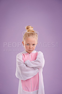 Buy stock photo Girl, bunny and plush with attitude, studio and arms crossed for easter. Child, costume and youth with pastel, rabbit and grumpy for holiday with childhood dress up isolated on purple background