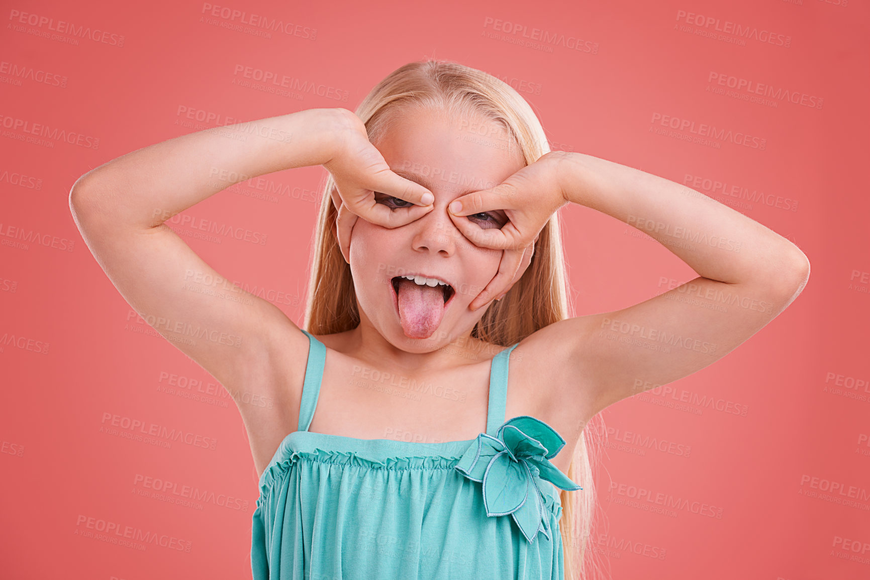 Buy stock photo Studio shot of a young girl posing on an orange background