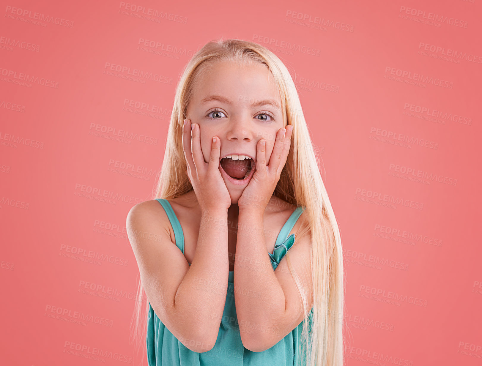 Buy stock photo Studio shot of a young girl posing on an orange background