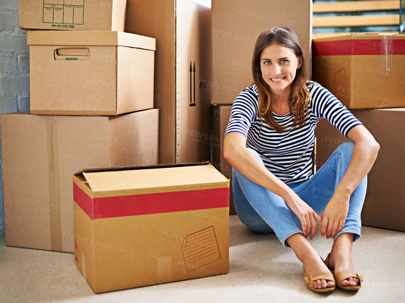 Buy stock photo Confident, boxes and portrait of woman in new home for moving to estate, property or apartment. Happy, smile and young female person with cardboard package for equipment and products in modern house.