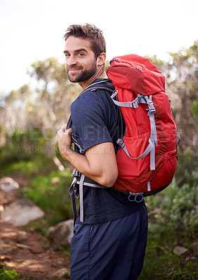 Buy stock photo Hiking, walking and portrait of man on mountain for fitness, adventure and travel journey. Backpack, summer and workout with male hiker trekking in nature path for training, freedom and explore