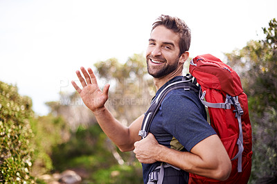 Buy stock photo Man, hike and happy with wave for adventure with backpack for fitness, workout and hobby in Canada. Portrait, smile and outdoor activity in nature for healthy mind in woods on summer holiday.
