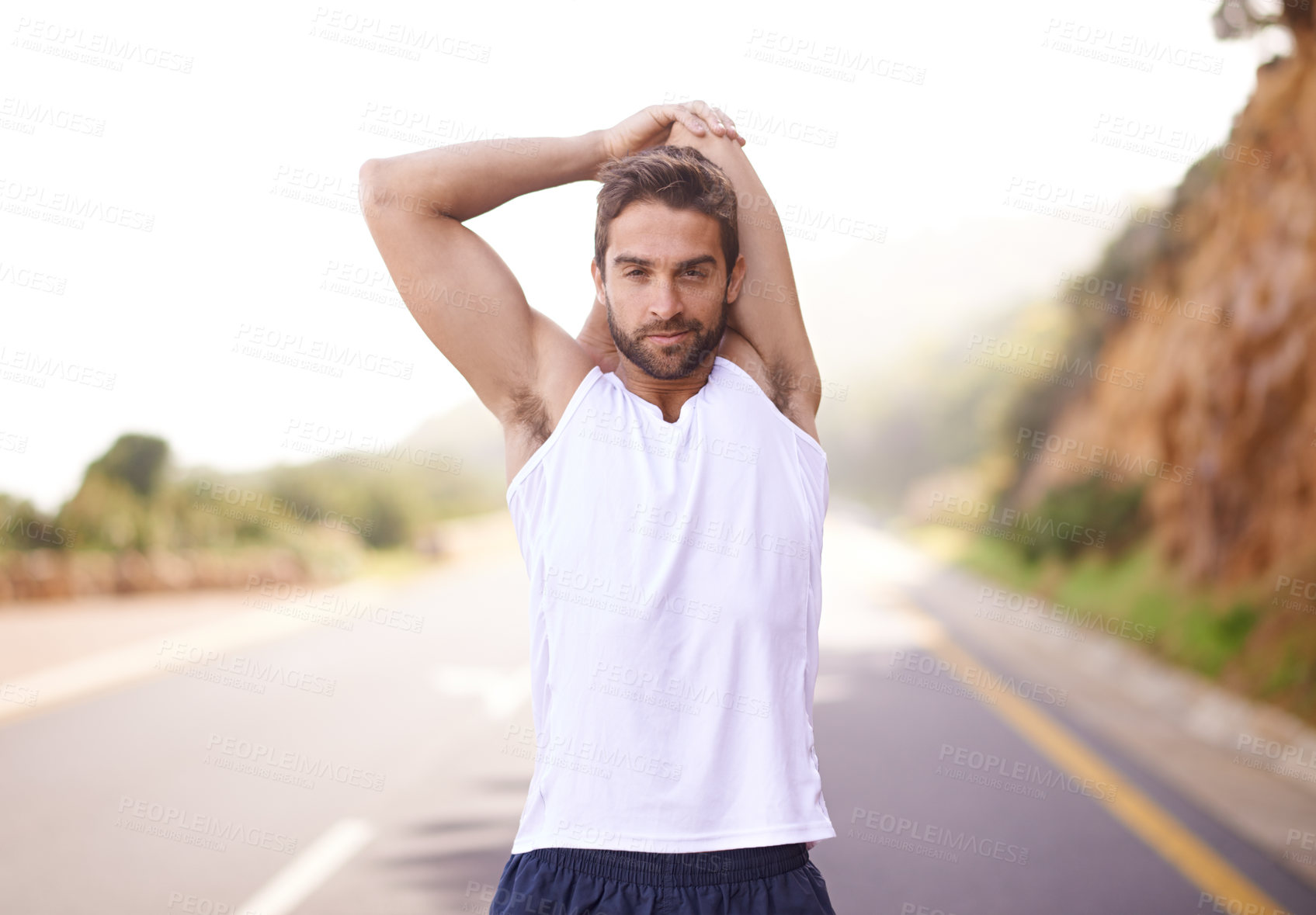 Buy stock photo Road, workout and stretching of man, smile and training for energy in nature of city of Cape Town. Adult, male person or runner ready for sport with exercise to relax, wellness and healthy for body