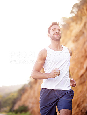 Buy stock photo Man, runner and active for outdoor workout, sports and nature for cardio or training for marathon. Male person, happy and fitness on mountain for performance challenge, athlete and exercise for race