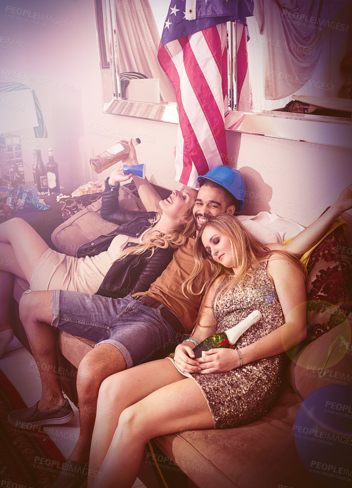 Buy stock photo Drunk, happy birthday or friends sleeping in a party on house sofa with a hangover from beer or alcohol. Happy man, tired women or crazy people nap on couch at fun new year celebration in Texas, USA