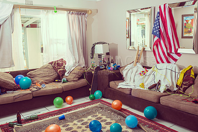Buy stock photo House, celebration and mess in living room after party, social event and birthday in usa. House party, trash and chaos in lounge with balloons, streamers and beer bottles on floor, furniture and sofa