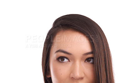 Buy stock photo Face of a model looking up at mockup space in a studio for product placement or marketing. Beauty, young and natural woman from Asia with empty mock up for advertising isolated by a white background.