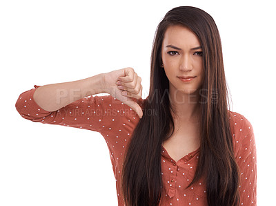 Buy stock photo Woman, thumbs down and frowning in frustration, wrong or expression against a white studio background. Portrait of isolated female model pointing thumb down for negative, incorrect or displeased