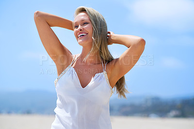 Buy stock photo Woman, fashion and laugh at beach in summer outfit for hot weather on holiday, break and rest in Los Angeles. Female person, smile or happy on leisure for vacation to relax, chill and arms in head