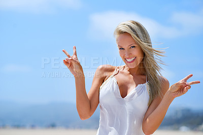 Buy stock photo Portrait, peace sign or happy woman at a beach to relax on vacation for break at sea in Athens, Greece. Tourist, sky or person at sea in summer fashion to travel with smile, wellness or confidence