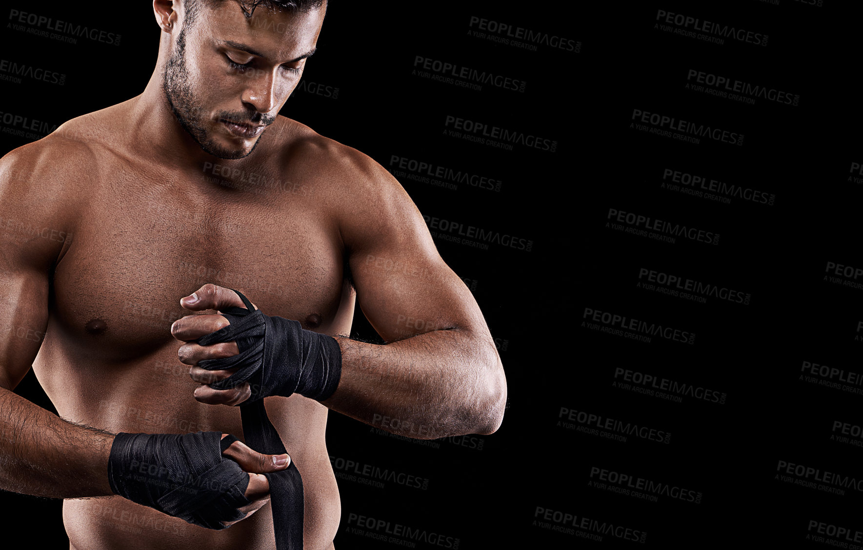 Buy stock photo Boxing, man and hand wrap in studio with getting ready to fight, exercise or training on mockup space. Athlete, boxer and martial arts workout for competition, wellness or topless on black background