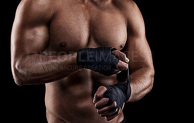 Buy stock photo Boxing, person or hand wrap in studio with getting ready to fight, exercise or training on mockup space. Athlete, boxer or martial arts workout for competition, closeup or topless on black background