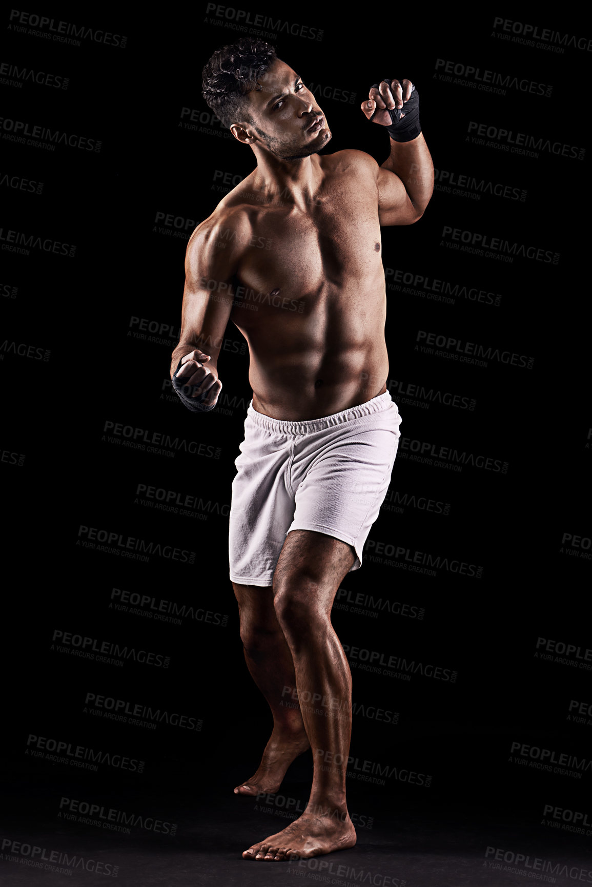 Buy stock photo Man, boxer and portrait in studio for fight, fitness and warrior training on black background. Person, athlete and strong muscles for workout or exercise, health and ready for battle or competition