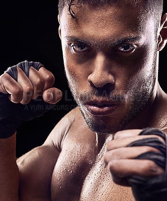 Buy stock photo Fitness, portrait and man boxer in studio for power, resilience and training on black background. Fighter, hands by face of sweaty kickboxing male at gym for wellness, exercise or energy workout