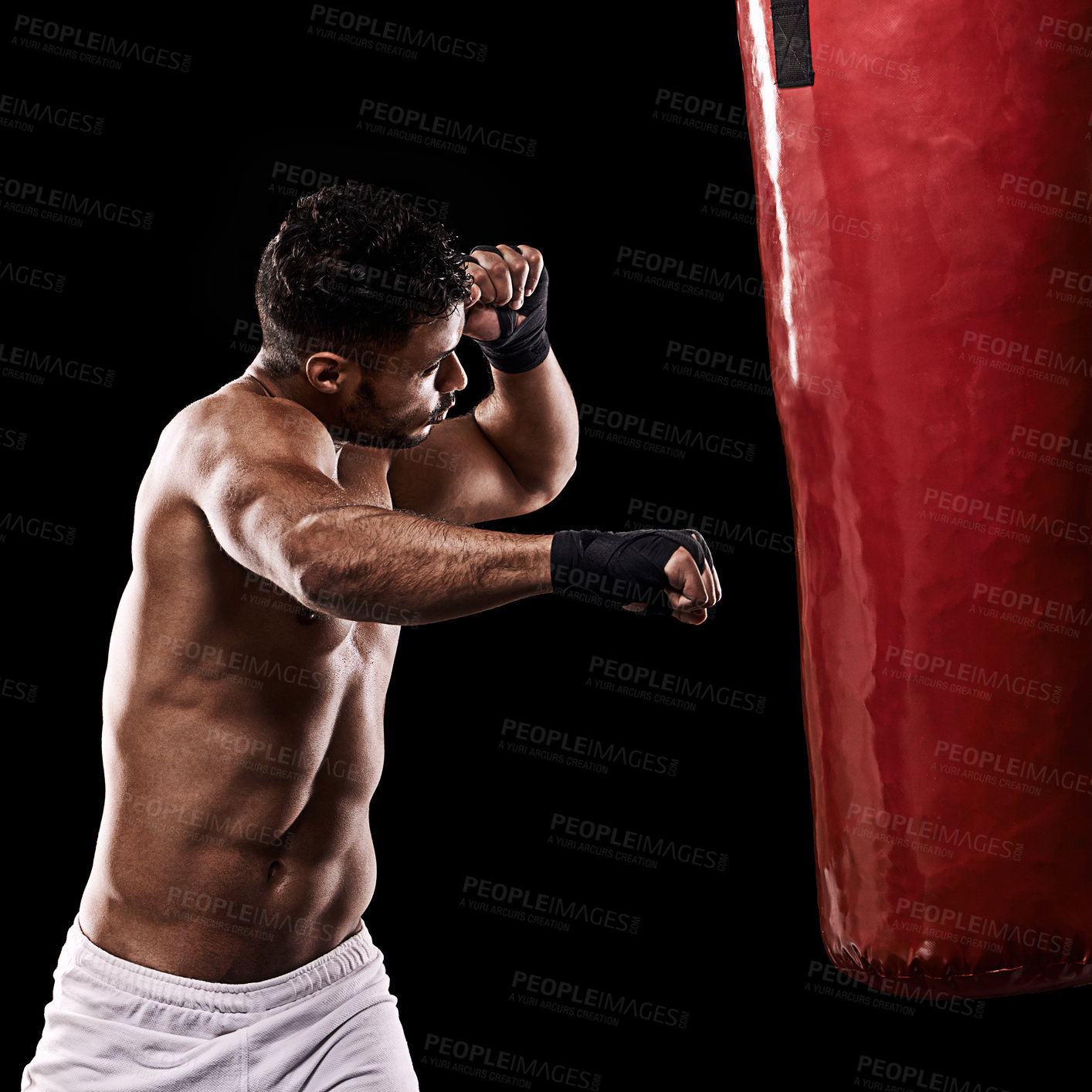Buy stock photo Boxing, man and workout in studio with punching bag for training, exercise or competition fight with fitness. Athlete, boxer and power for martial arts with performance or topless on black background