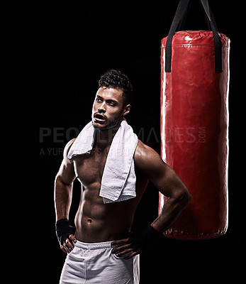 Buy stock photo Tired, boxer and man with towel in studio with gloves for training with strength and muscle. Adult, athlete and male person in dark background, healthy and power with body, punching bag and sport