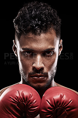 Buy stock photo Ready, boxer and portrait of man in studio with gloves for training with strength and muscle. Adult, athlete and male person in black background, healthy and serious on face, closeup and sport