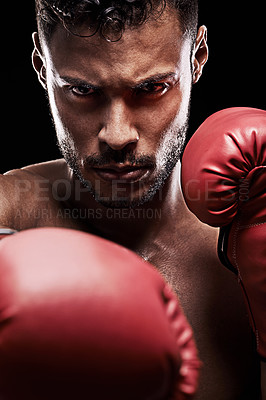 Buy stock photo Portrait, boxing gloves and face for male boxer, studio and  athlete on black background. Dark, training and combat sports or MMA for man model, workout, muscle and impact activity for martial arts