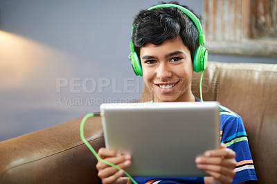 Buy stock photo Tablet, portrait or boy with headphones on sofa for gaming, search or sign up at home. Digital, search and face of happy kid with app for elearning, streaming or educational, video or film