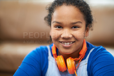 Buy stock photo Children, portrait or girl with headphones in a house with music, relax and chilling on weekend. Happy, face and kid in living room streaming album, playlist or audio storytelling for remote learning