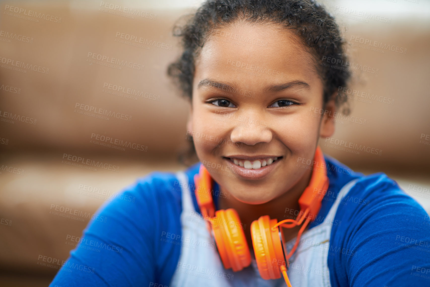 Buy stock photo Children, portrait or girl with headphones in a house with music, relax and chilling on weekend. Happy, face and kid in living room streaming album, playlist or audio storytelling for remote learning