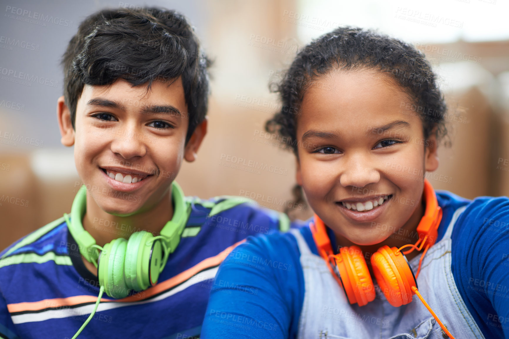 Buy stock photo Portrait of a little brother and sister listening to music