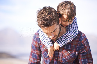 Buy stock photo Beach, piggy back and man with child on shoulders, smile and relax on outdoor adventure. Support, father and son in nature for fun, bonding and happy trust on ocean holiday together with travel