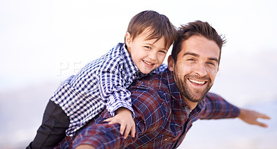 Buy stock photo Nature, portrait and father with child flying on shoulders, smile and travel on outdoor adventure. Support, face of dad and son in nature for fun, bonding and happy trust on ocean holiday together
