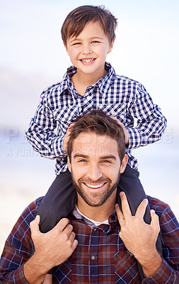 Buy stock photo Beach, portrait and father with child on shoulders, smile and mockup space on outdoor adventure. Support, face of dad and son in nature for fun, bonding and happy trust on ocean holiday together