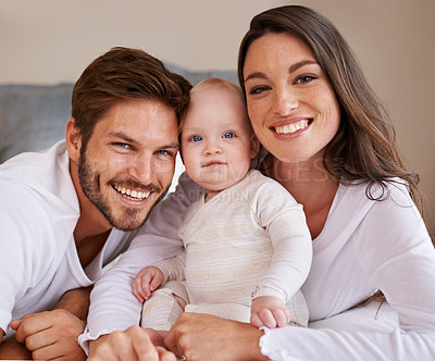 Buy stock photo Portrait, happy family and parents with baby for love, care and quality time to relax together in house. Mother, father and smile with cute infant kid for happiness, support and newborn development