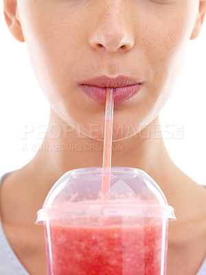 Buy stock photo Woman, juice and straw in studio for fruit, healthy and smoothie for drink and vitamin. Young person or model and beverage for cold, refresh and strawberry for delicious and icy in plastic cup