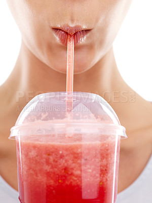 Buy stock photo Lips, straw and drinking a smoothie in studio, nutrition and wellness with juice on white background. Person, closeup and milkshake for weight loss or detox, minerals and vegetarian fiber or organic