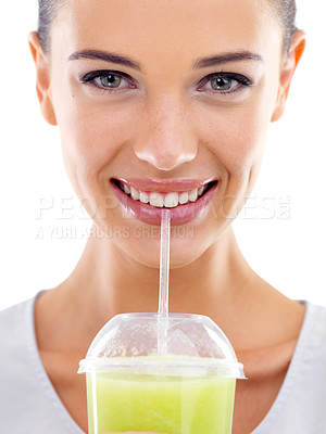 Buy stock photo Woman, portrait and smoothie for drinking in studio, nutrition and smile for taste on white background. Happy female person, diet and milkshake for weight loss or detox, minerals and organic fiber