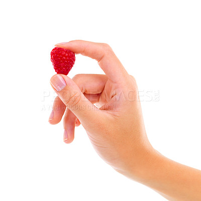 Buy stock photo Hand, raspberry and healthy food for nutrition, wellness and weight loss with ingredient isolated on white background. Person with fruit, sweet or sour with diet, red berries for detox and vegan
