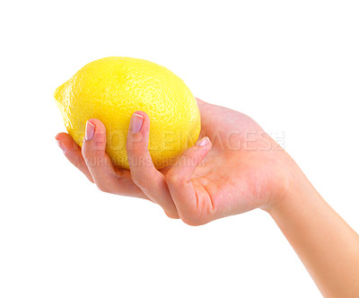 Buy stock photo Closeup studio shot of a woman holding a lemon isolated on white
