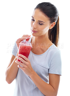 Buy stock photo Woman, smoothie and drinking for detox in studio, nutrition and satisfaction for taste on white background. Female person, diet and milkshake for weight loss or health, minerals and wellness fiber