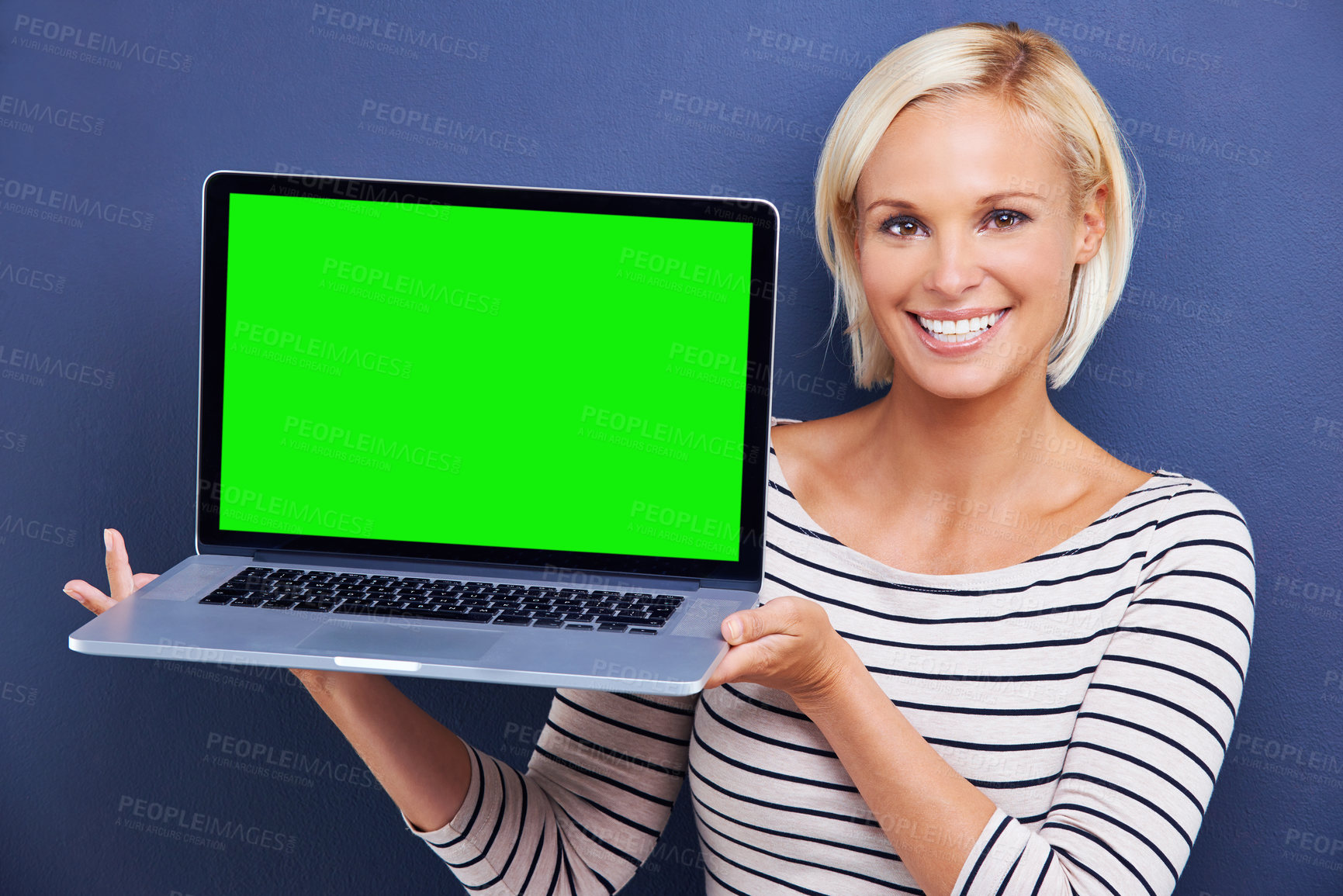 Buy stock photo Portrait, green screen and woman with a laptop, connection and internet on a blue studio background. Face, person and mockup space with model and computer with email and promotion with technology