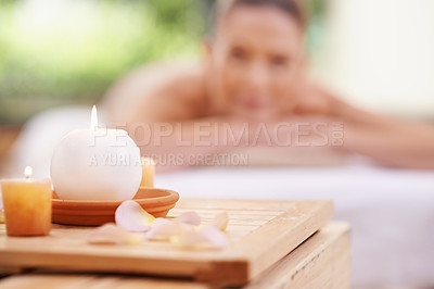 Buy stock photo Candles, petals and holistic healing at spa with aromatherapy, wellness and treatment for self care. Detox, stress relief and energy balance for aura with tools, luxury and natural with zen and calm