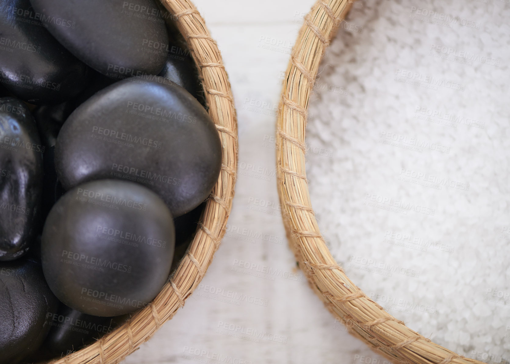 Buy stock photo Closeup shot of warm stones waiting to be used for a massage