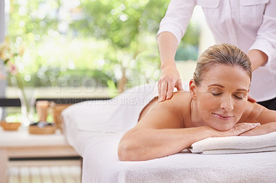 Buy stock photo Woman, hands and spa with massage therapist for wellness peace or stress relief at zen resort, calm or vacation. Female person, eyes closed and comfortable for healthy skincare, treatment or luxury